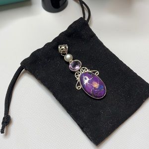 A beautiful Purple Copper Turquoise with an Amethyst gemstone